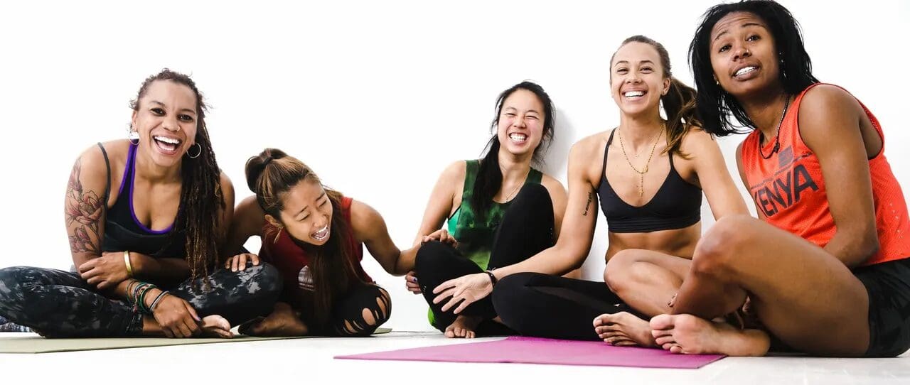 Group of employees having fun during a wellness workshop.